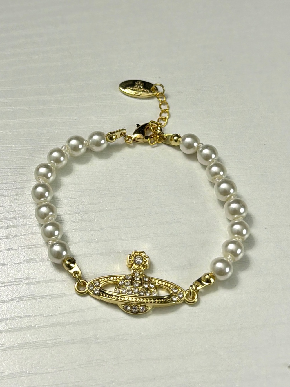 Vivienne Westwood Gold Orb Pearl Bracelet with Crystal Accents